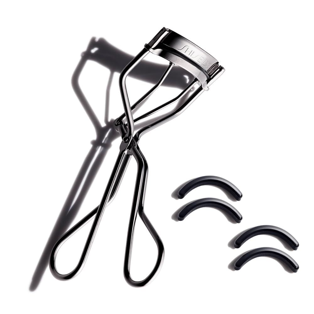 Shiseido Eyelash Curler + Two Sets of Eyelash Curler Replacement Pads (4 Pads Total) - Crimps & Curls Lashes for Perfect, Eye-Framing Fringe - Gentle & Safe